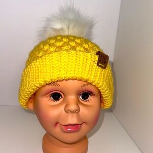 Beautiful yellow, crocheted, winter hat.